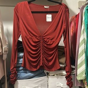 Deep red long sleeve top from free people